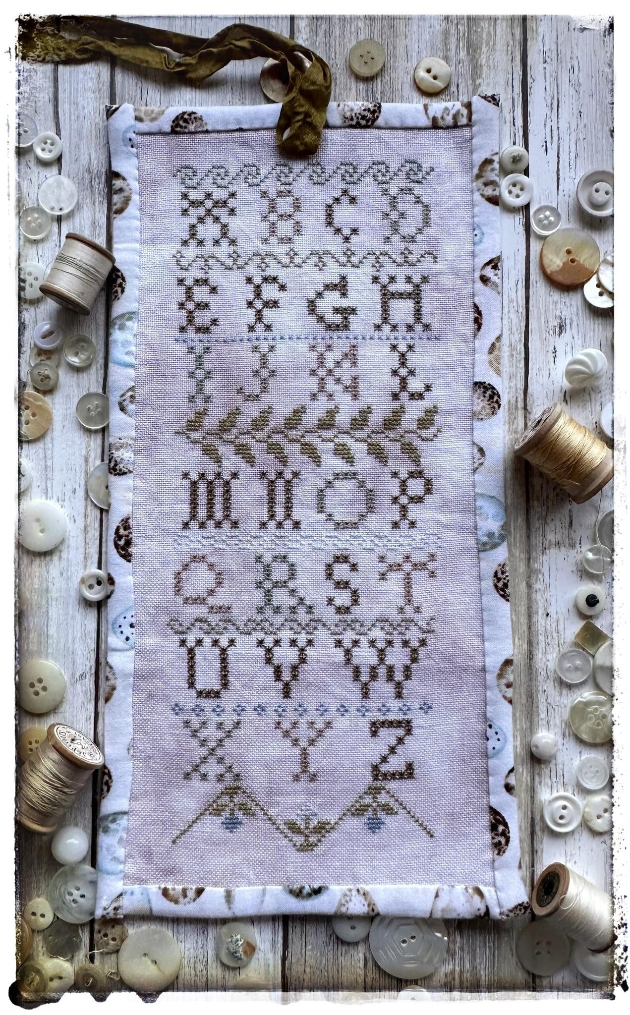 Preorder - Eyelet Sampler Roll by Lucy Beam